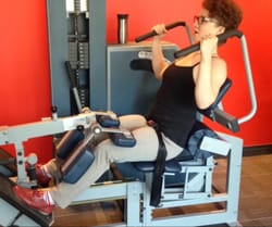 Woman practicing safe exercise techniques and progressions.