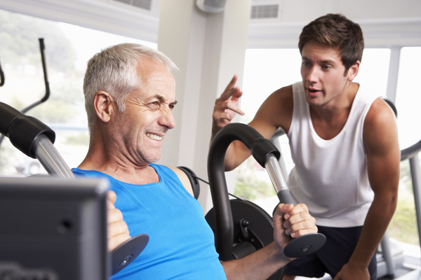 older man working out in the gym